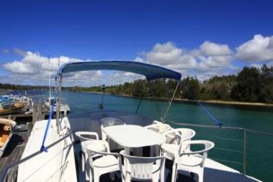 houseboat deck with icebox relax and enjoy some time out- Forster NSW