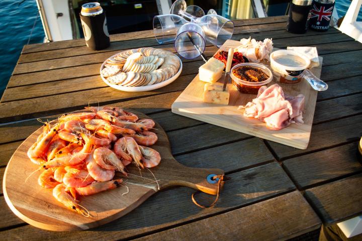 relaxing bite to eat before the BBQ Boat - book at Forster Luxury houseboats NSW