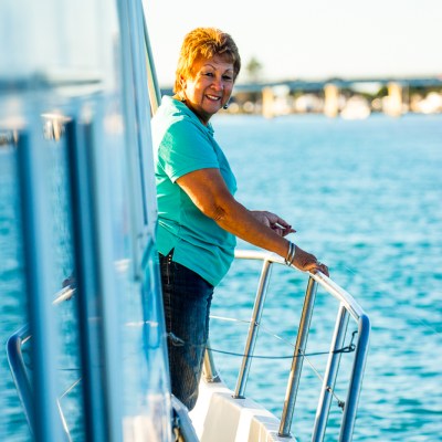 Enjoying the view and relaxing into a vacation on a Forster houseboat hire at Forster NSW
