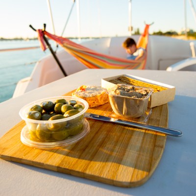 Relax enjoy a layback lifestyle houseboat life food at the ready - book Forster Luxury Houseboats NSW