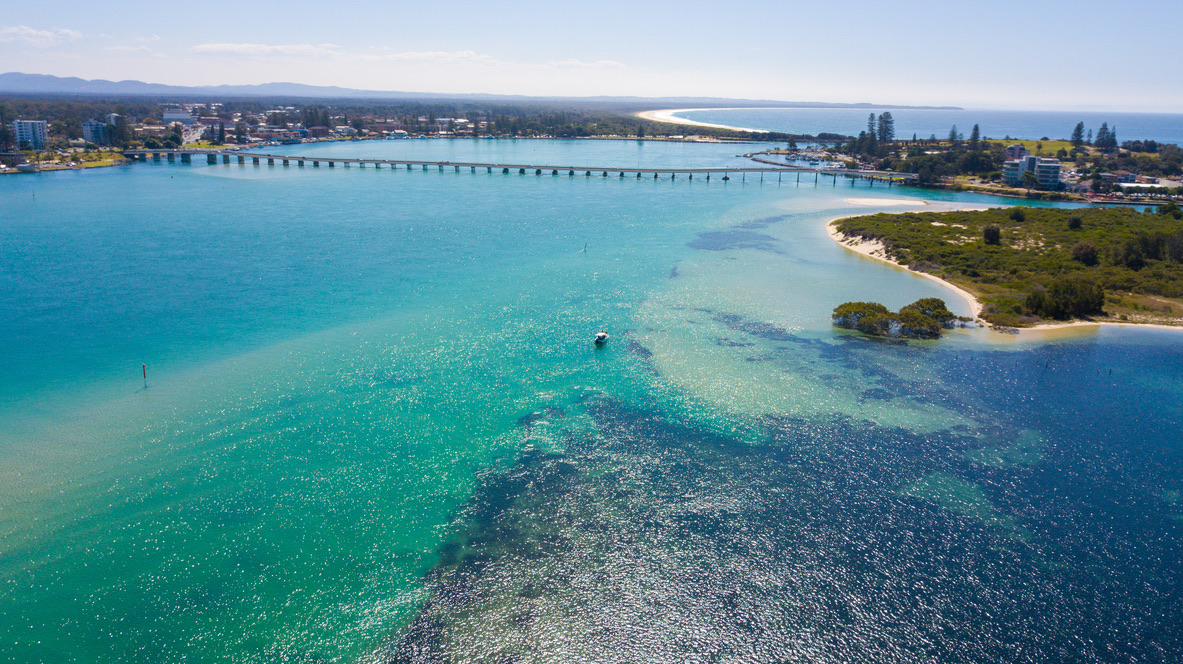 Stand-up paddleboard hire on Wallis Lake, Forster NSW